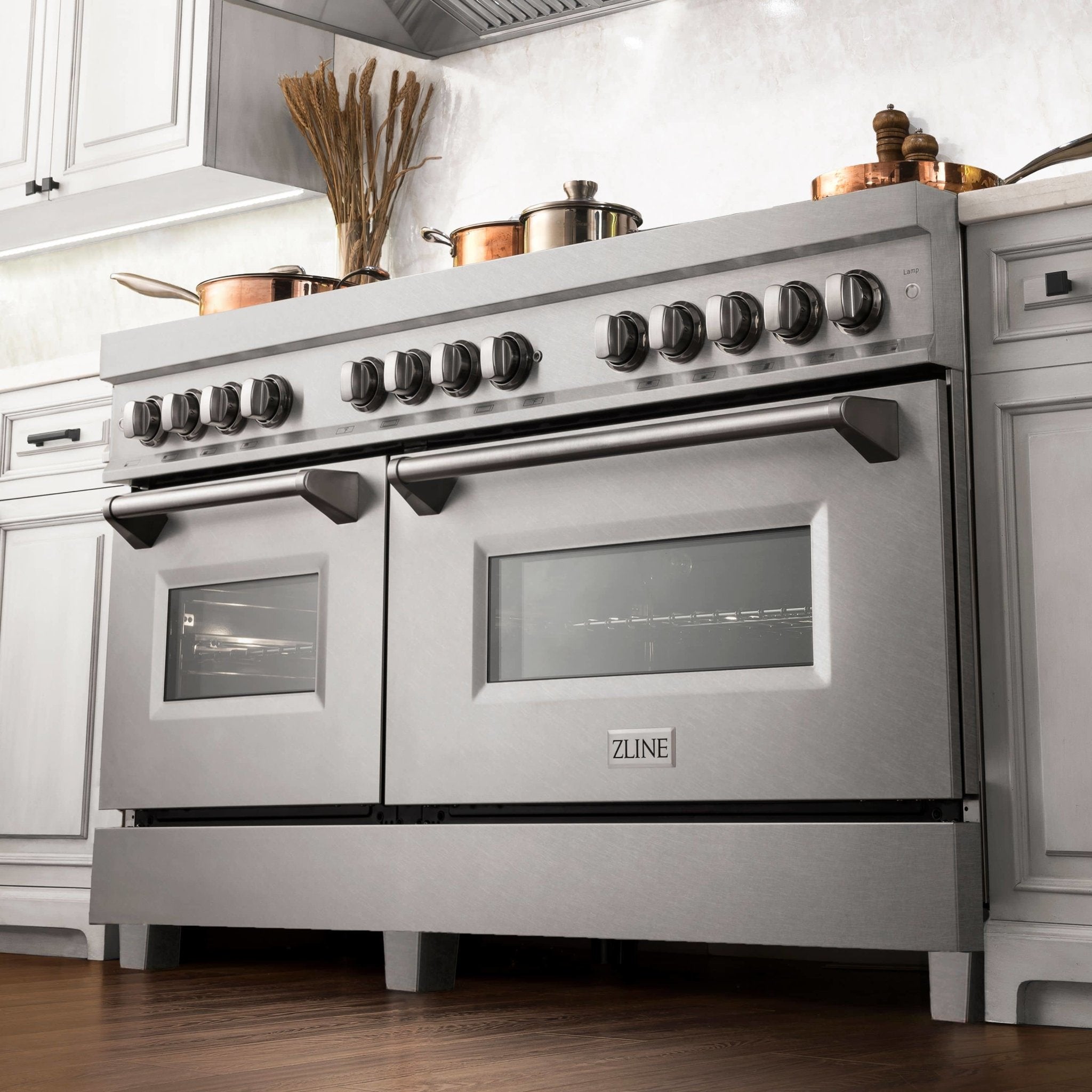 Stainless steel dual fuel range with front control knobs and two glass oven doors