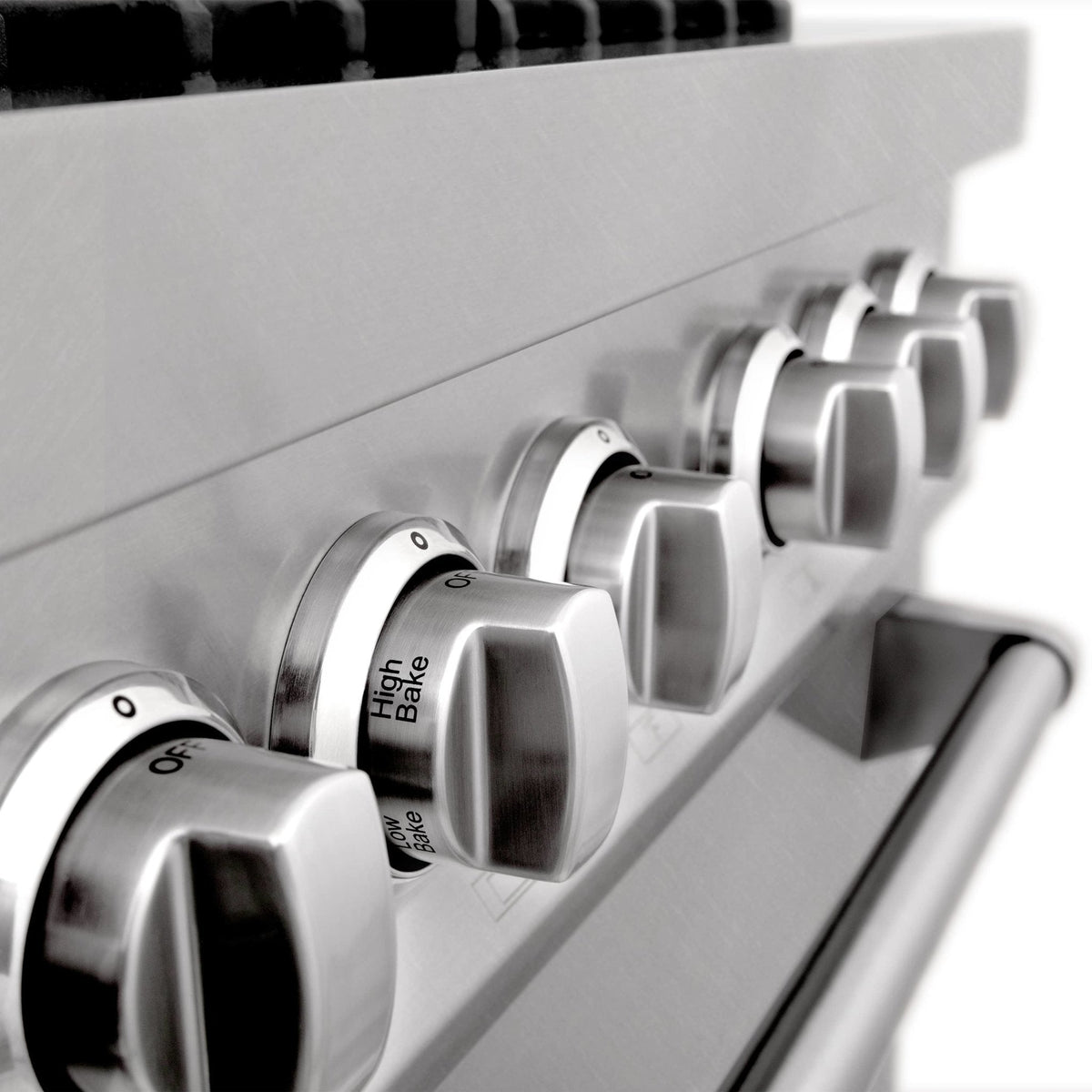 Dual fuel range control knobs on stainless panel with cooking mode labels