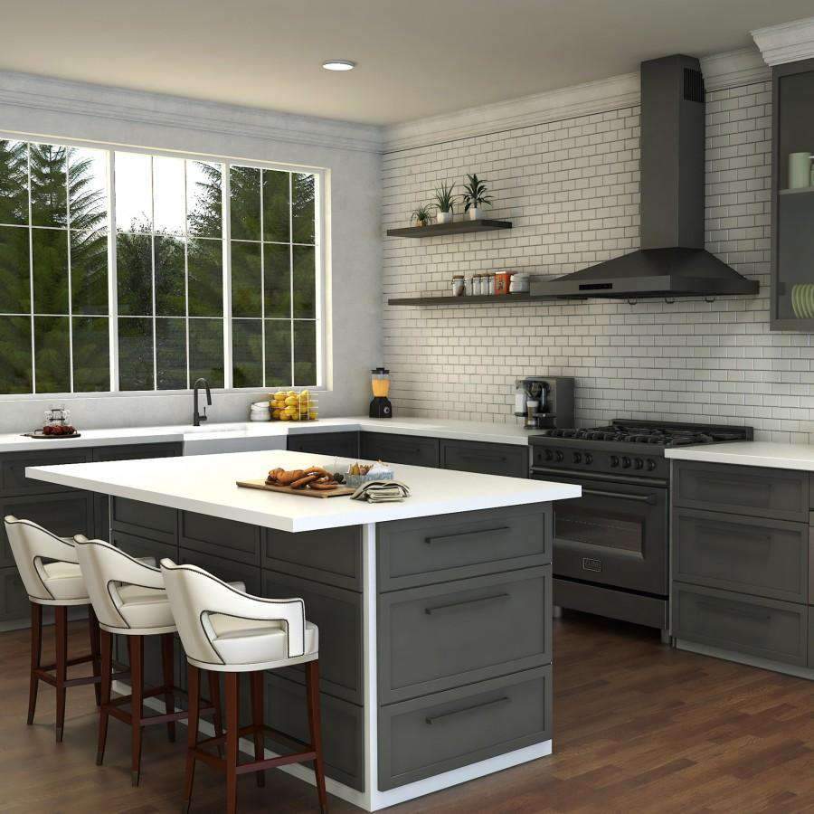 Matte black kitchen faucet with arched spout and side sprayer on countertop sink