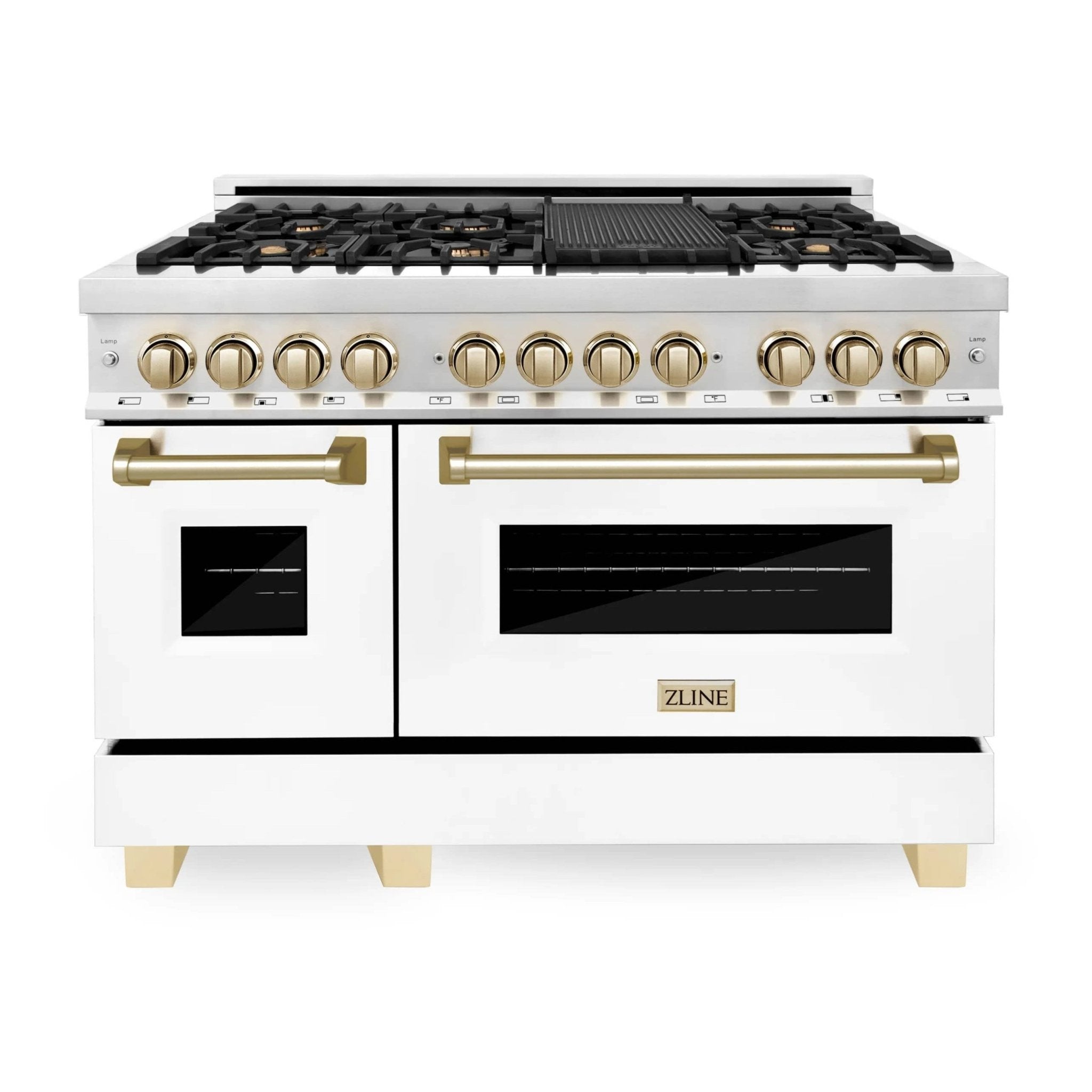 White dual-oven range with brass trim, knobs, and oven doors