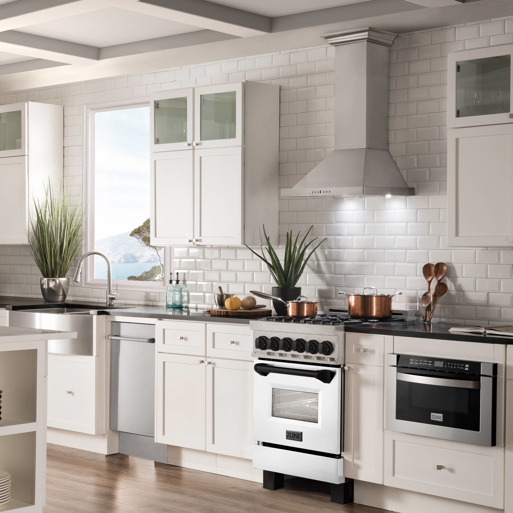 Dual fuel range with black glass door and black cooktop with burner grates