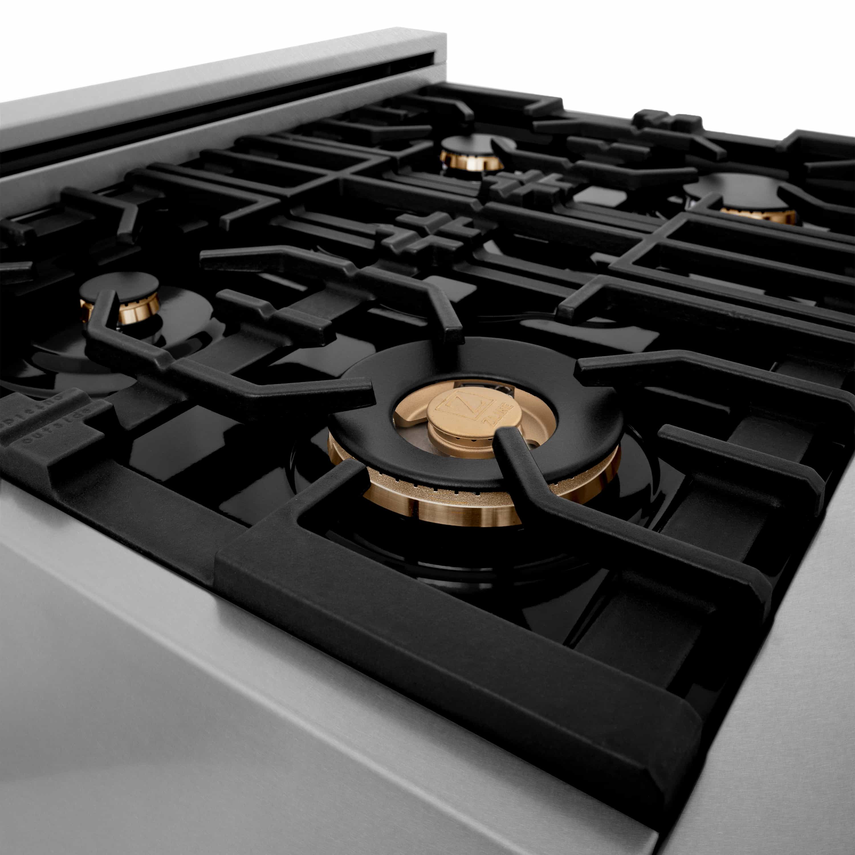 30-inch gas cooktop with black grates and gold-accent burner controls on satin stainless