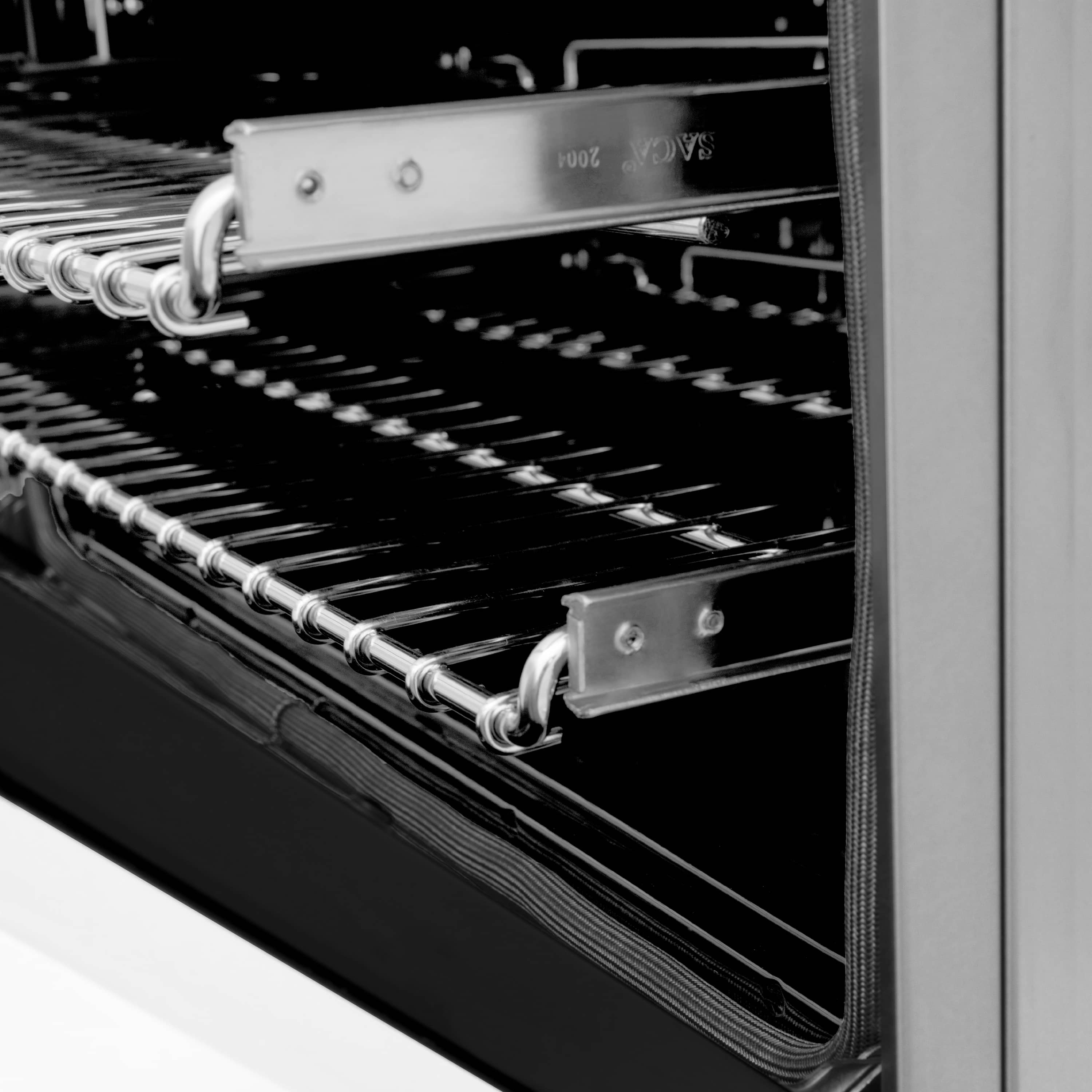 Electric oven interior rack with chrome heating elements and black enamel walls