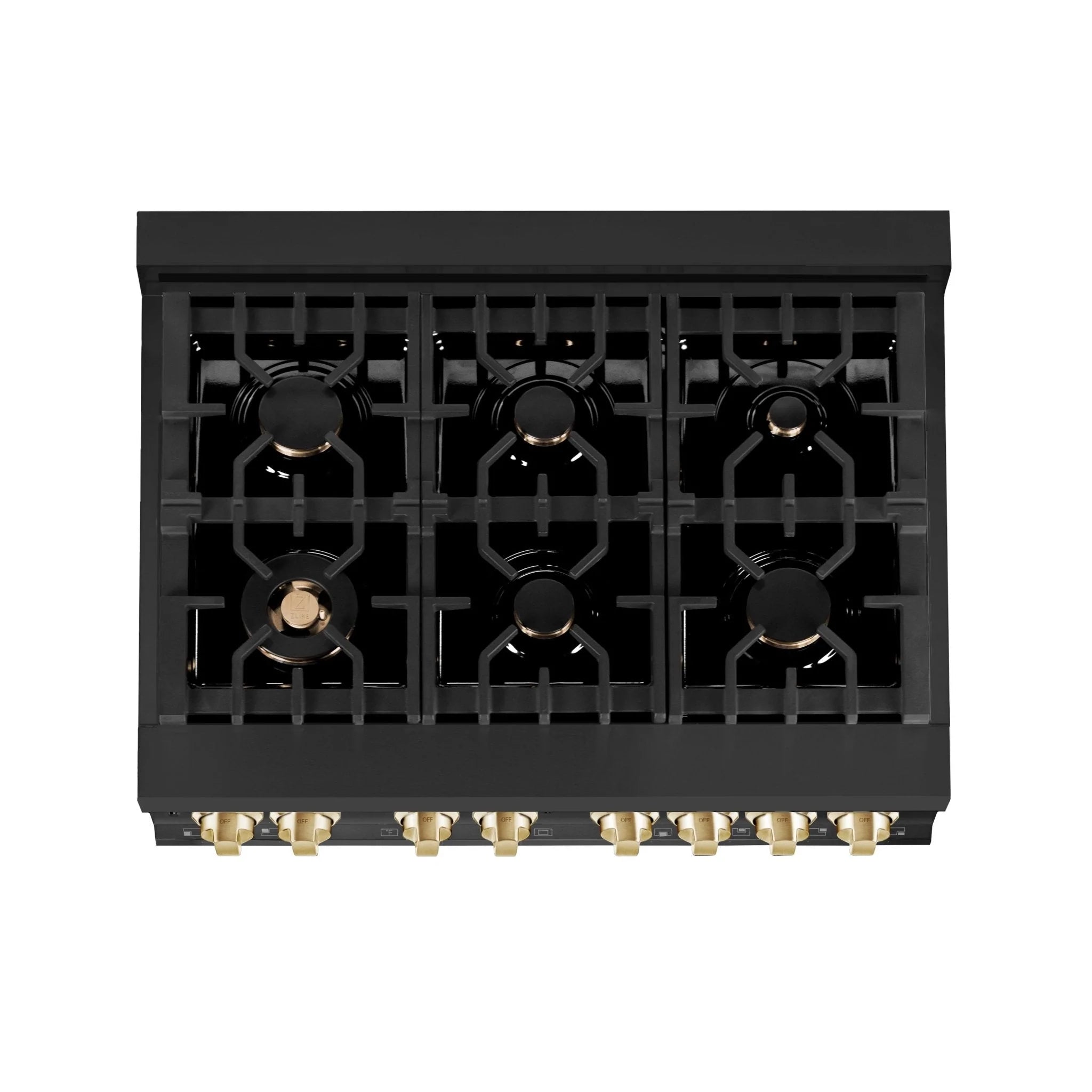 Black cooktop burner area with six brass burner caps