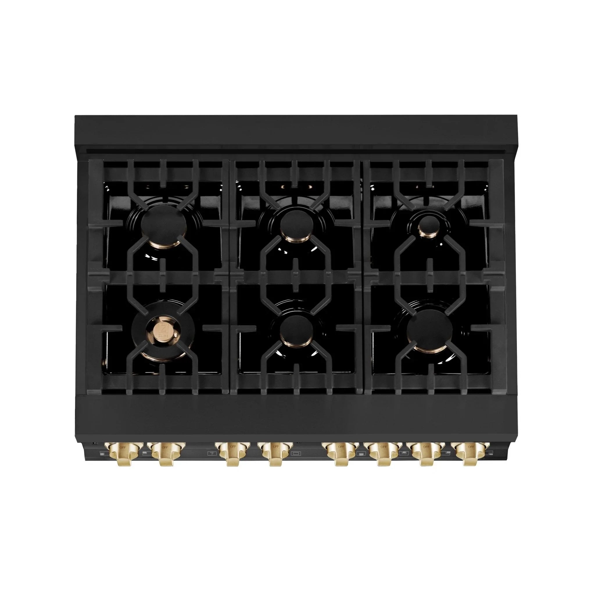 Black gas cooktop with burner grates and gold burner caps