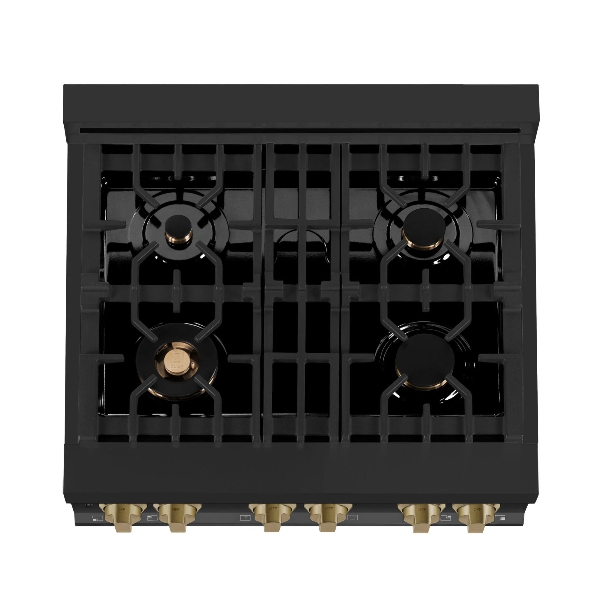 Top view of black cooktop with four gas burners and gold base fittings