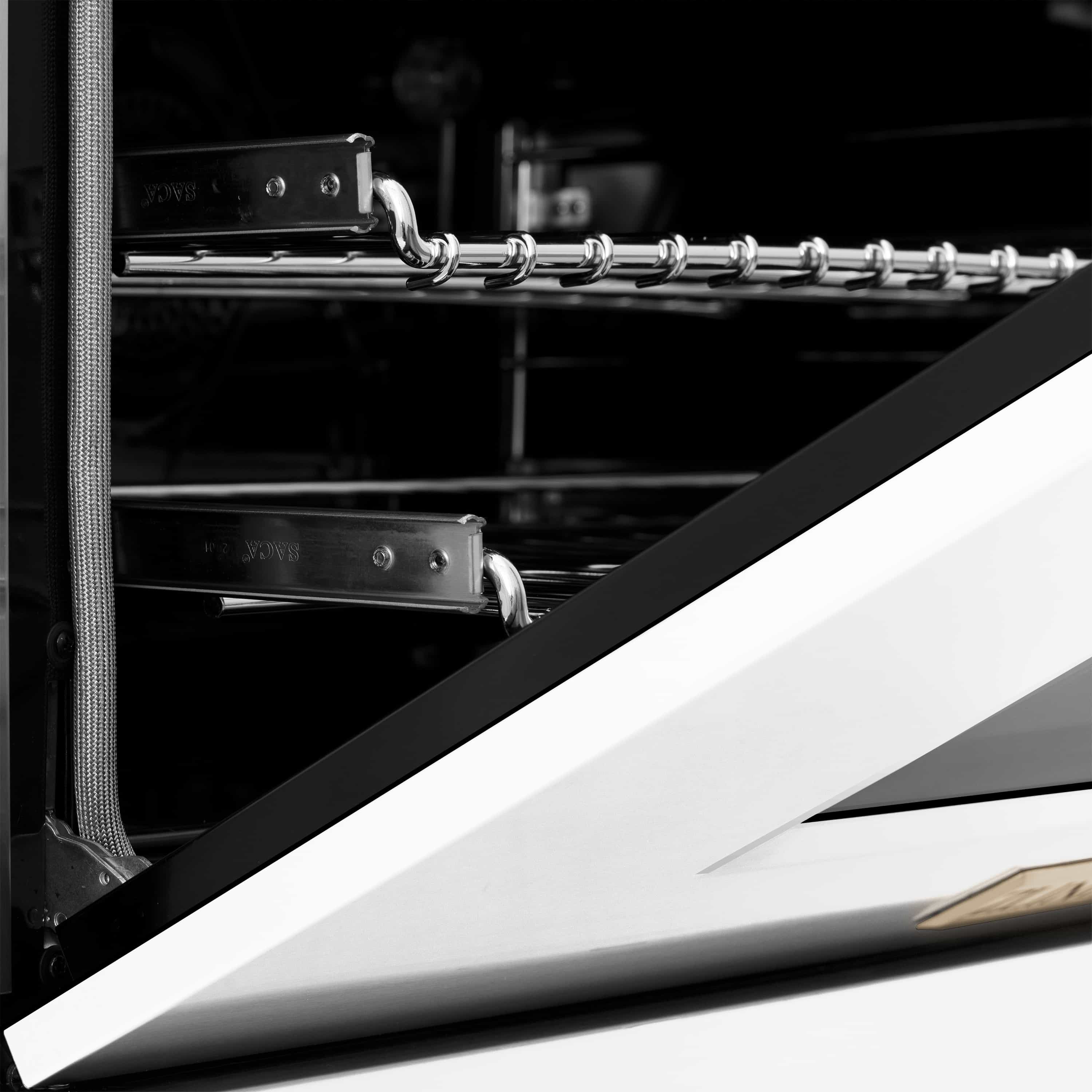 Stainless steel oven handle with gold accents on a dual-fuel range