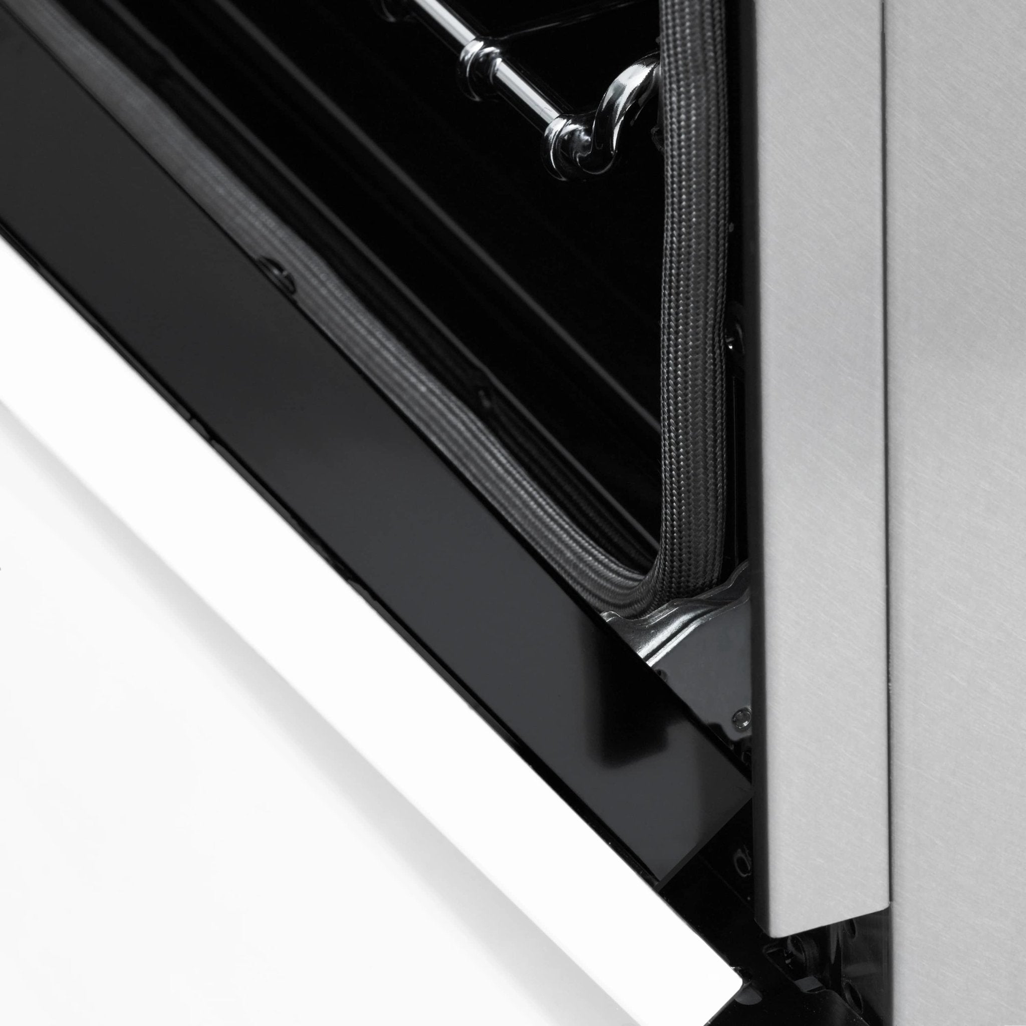 Oven door seal and hinge area with dark gasket channel on white frame