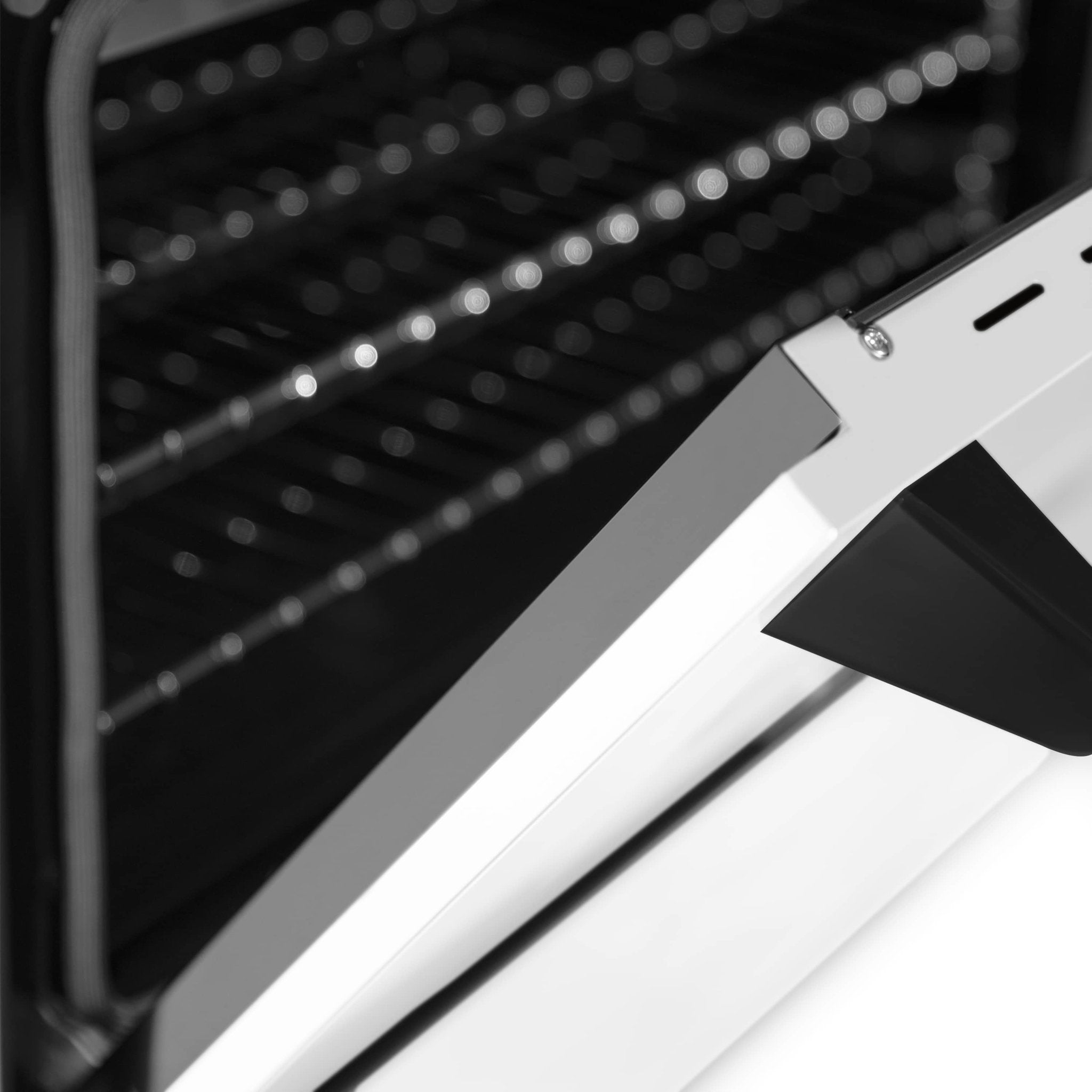Dual-fuel range oven door handle and black trim edge