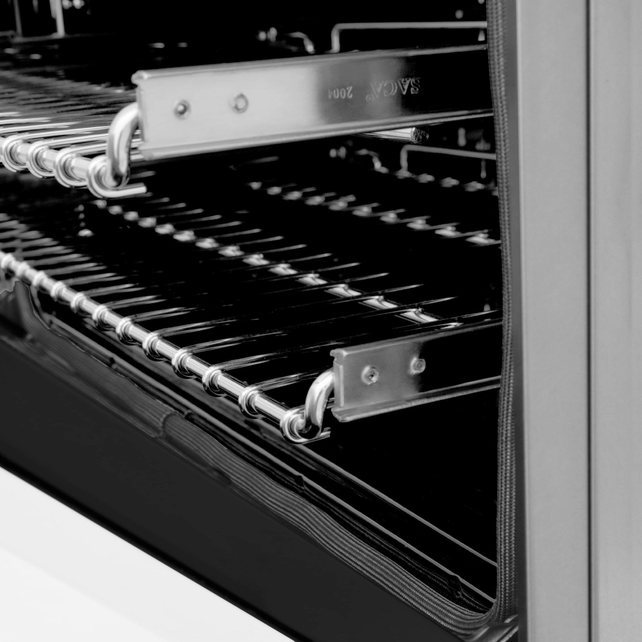 Dual-fuel range oven interior with wire rack shelves and chrome side rails