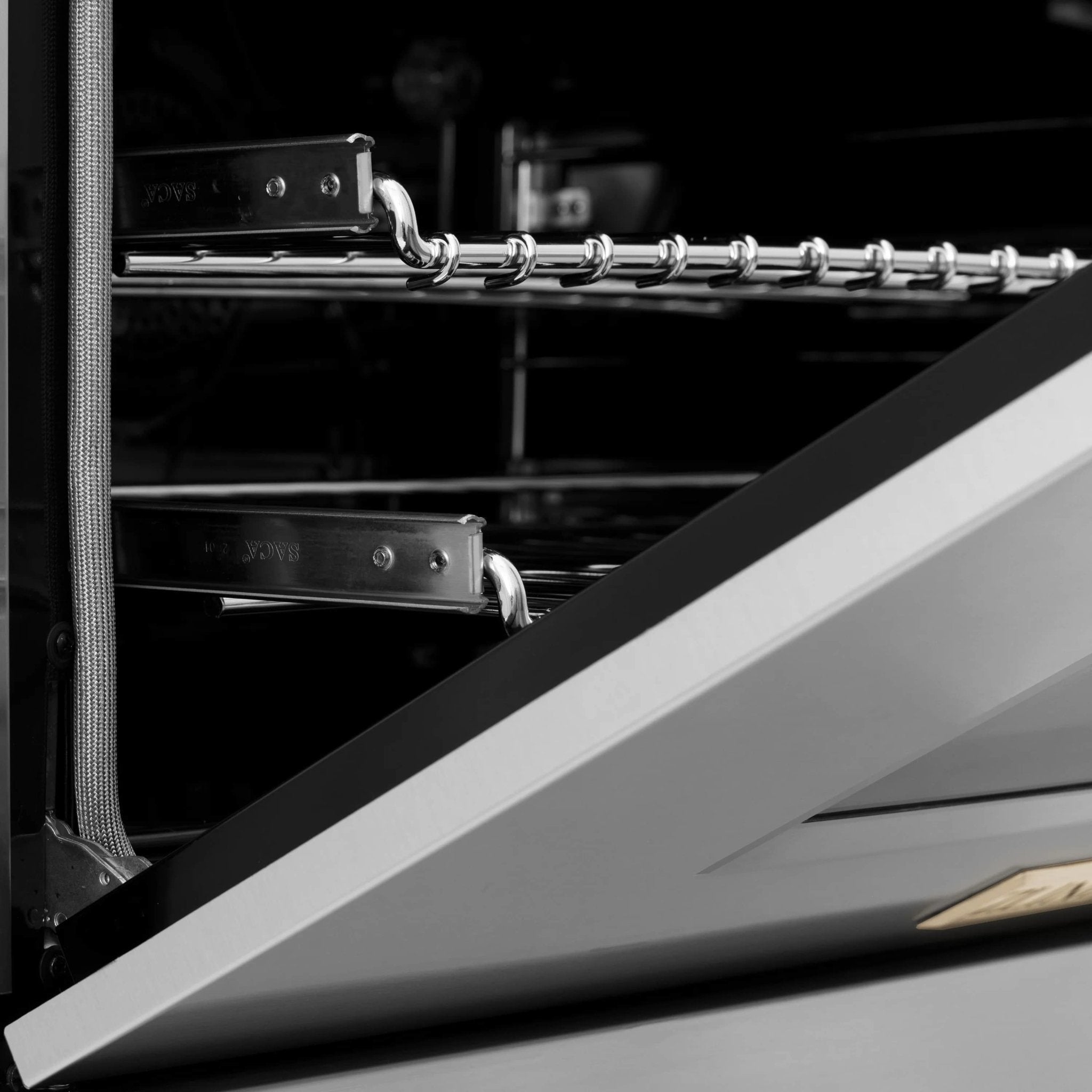 Stainless oven interior with sliding rack rails and dark oven cavity