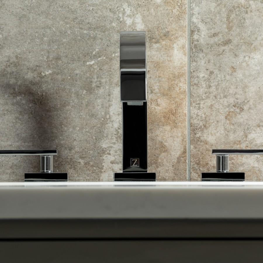 Chrome bath faucet with arched spout and vertical control handle, Z logo detail