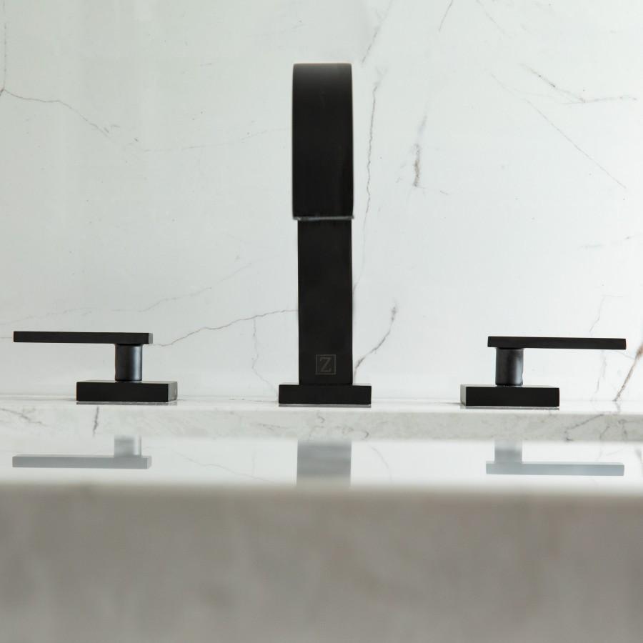 Matte black bathroom faucet with tall central spout and two side handles