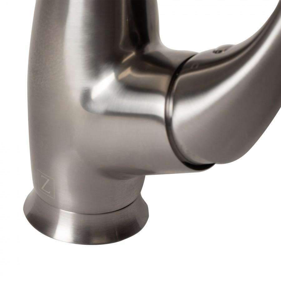 Brushed nickel kitchen faucet base and curved spout detail