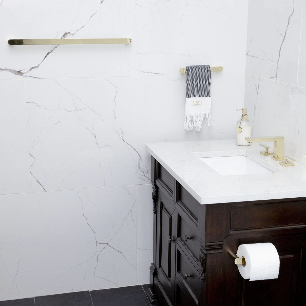 Polished gold bathroom sink faucet with two handles and long straight spout