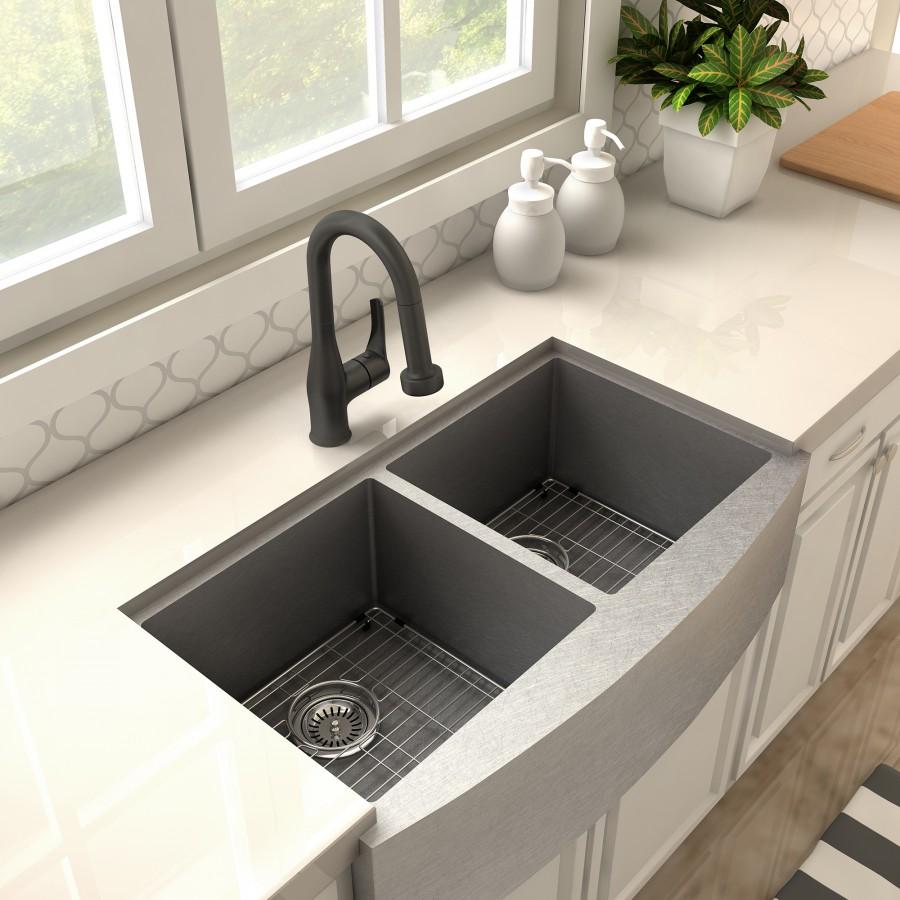 Matte black kitchen faucet with high-arc spout over double-basin sink