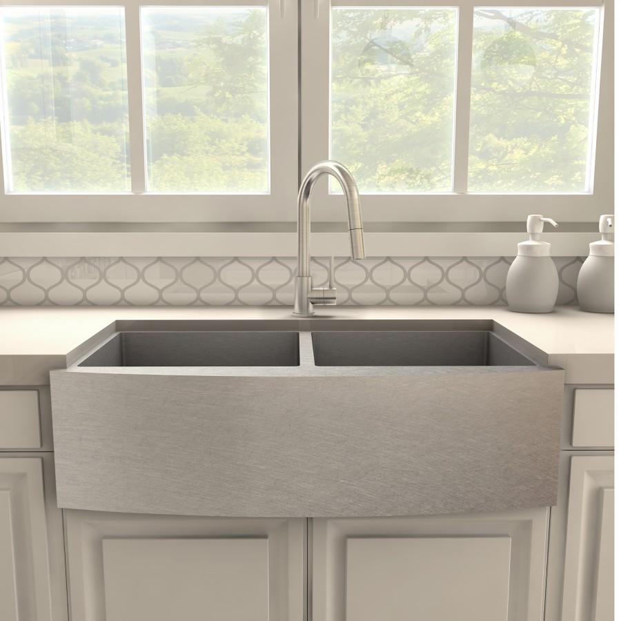 Brushed nickel kitchen faucet with tall arched spout and single lever handle