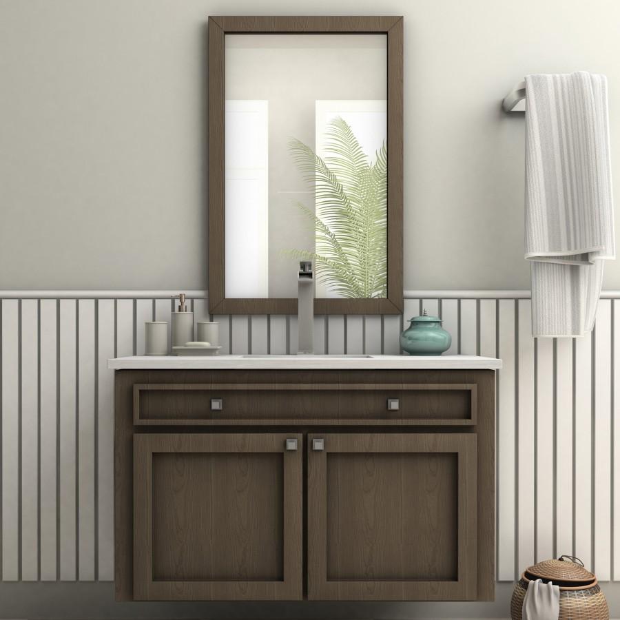 Chrome bath faucet over rectangular sink with tall spout and single lever.
