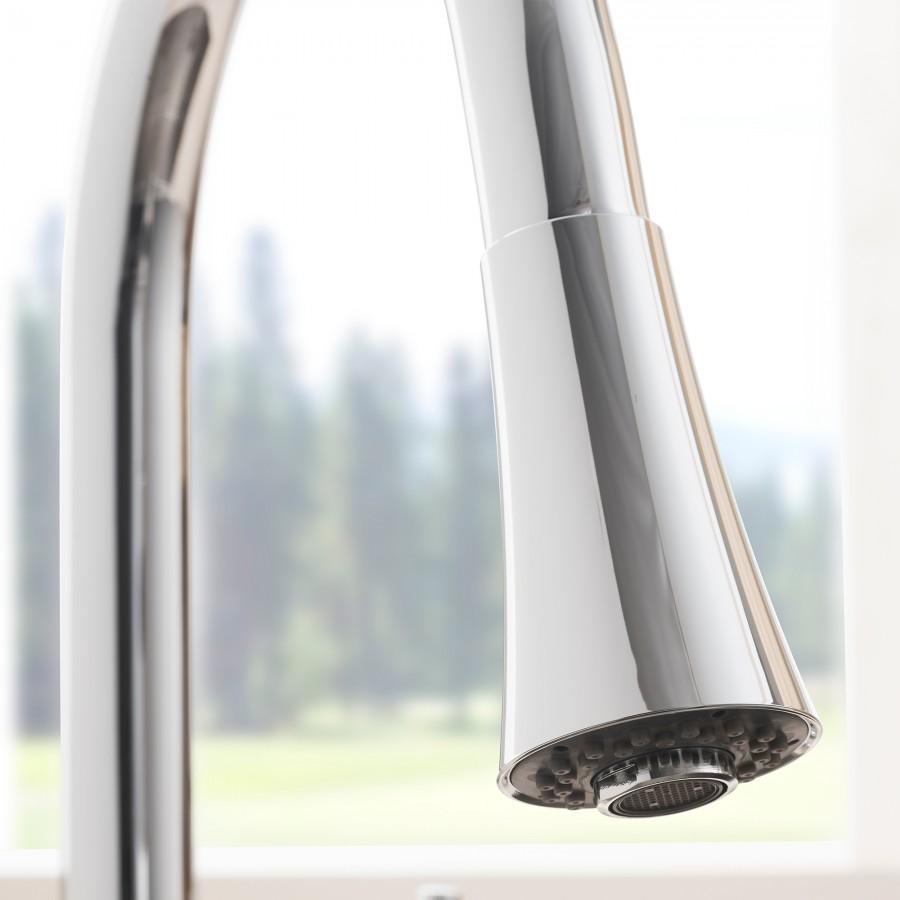 Close-up of chrome faucet spout tip and aerator