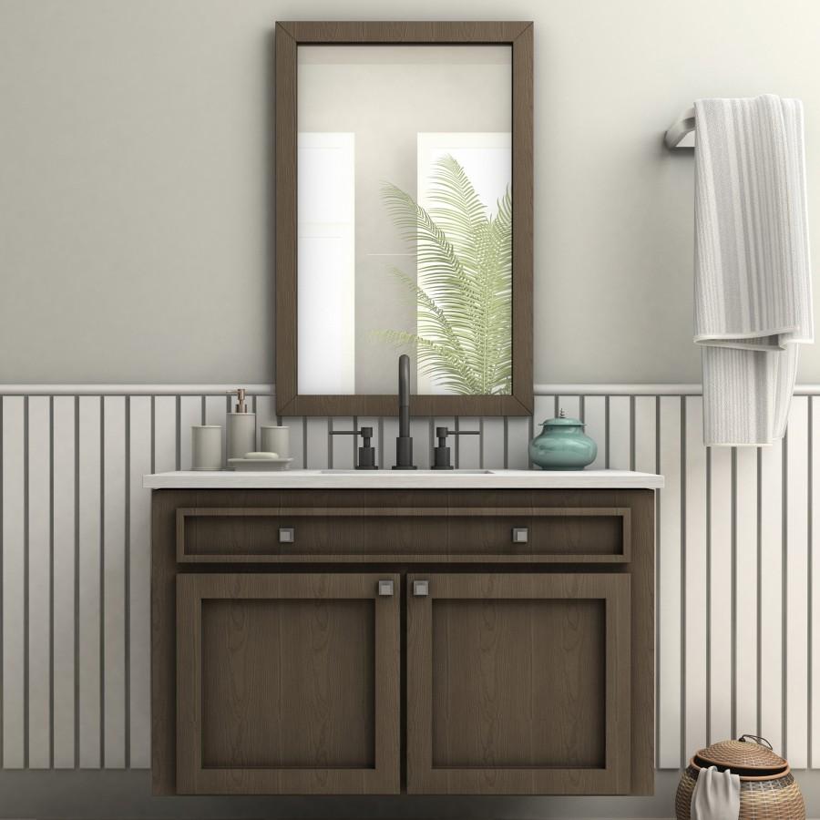 Matte black widespread bath faucet with curved spout and two handles on vanity