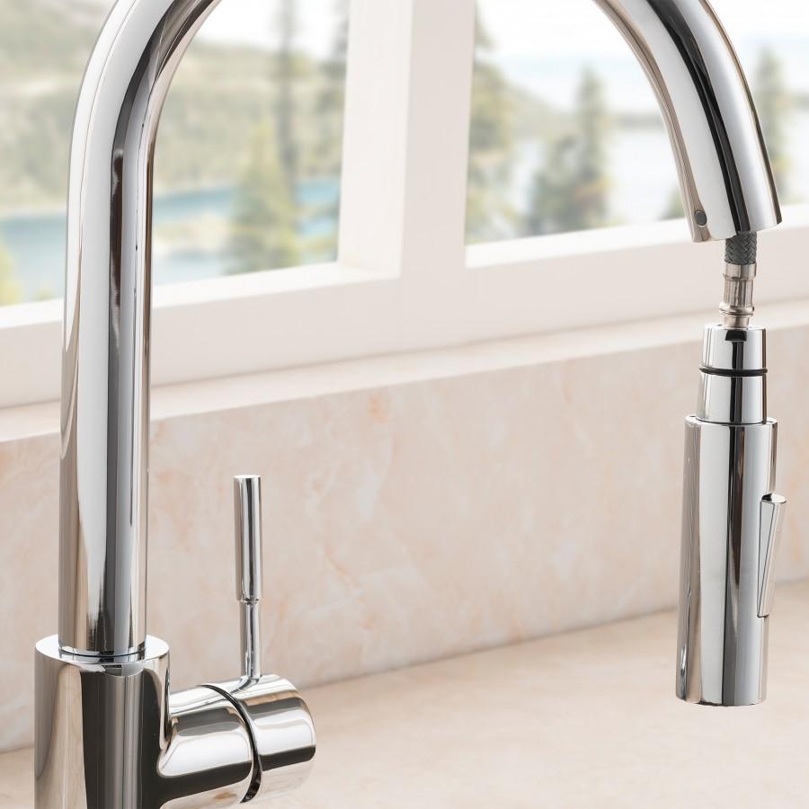 Chrome faucet with tall arched spout and two round control handles