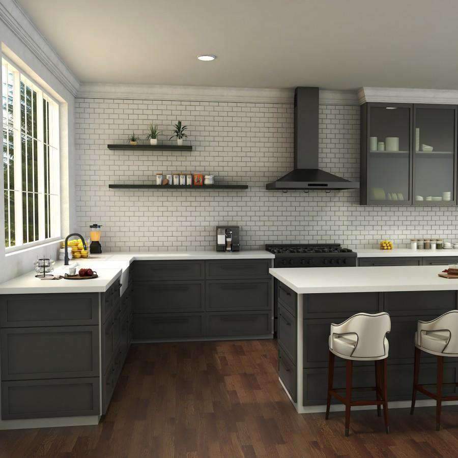 Matte black kitchen faucet on white countertop beside a kitchen sink