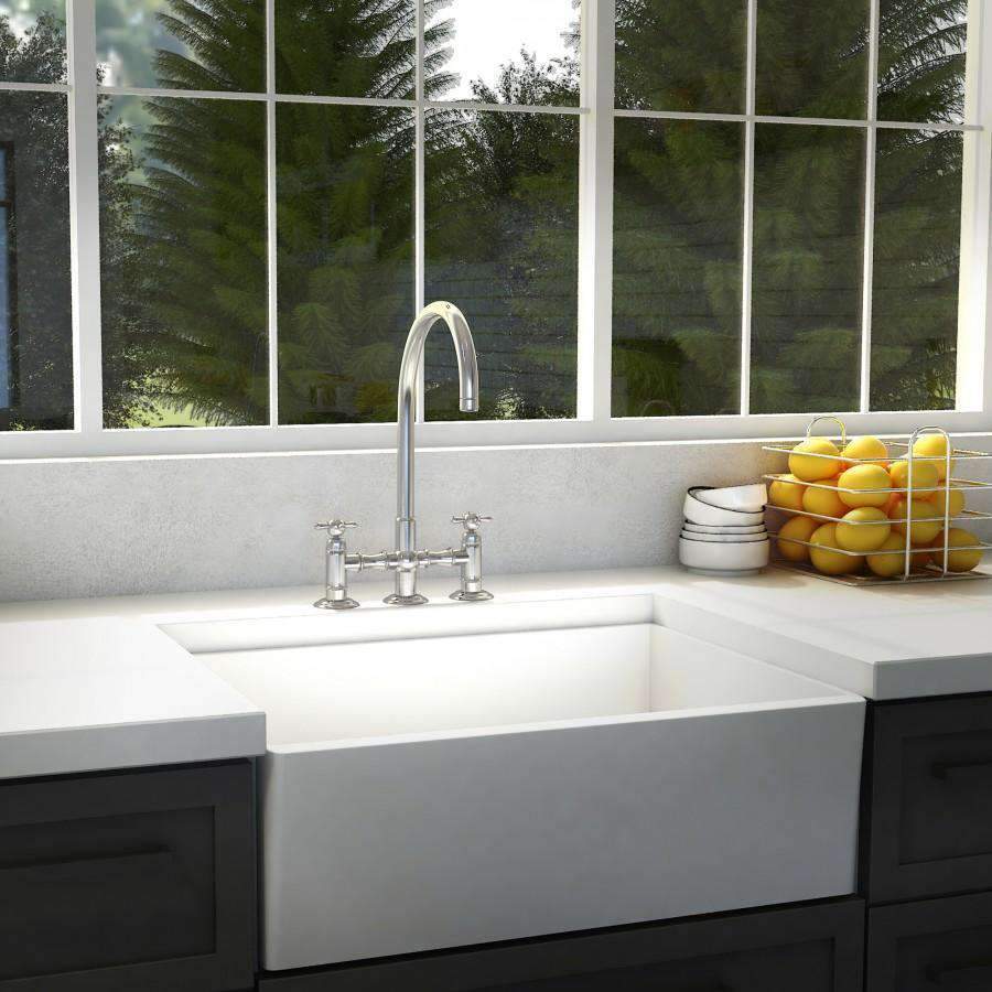 Chrome kitchen faucet with tall gooseneck spout and two cross-handle controls