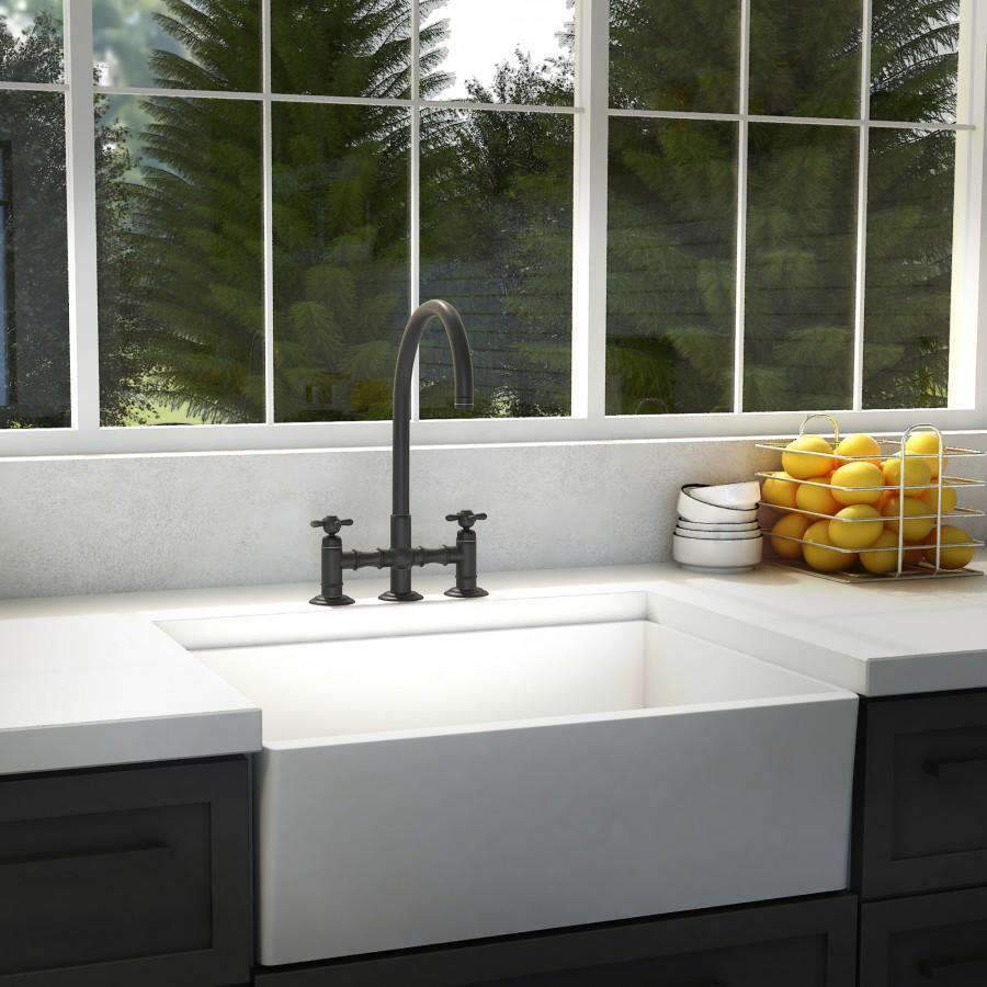 ZLINE Mona kitchen faucet in oil-rubbed bronze on double basin sink.