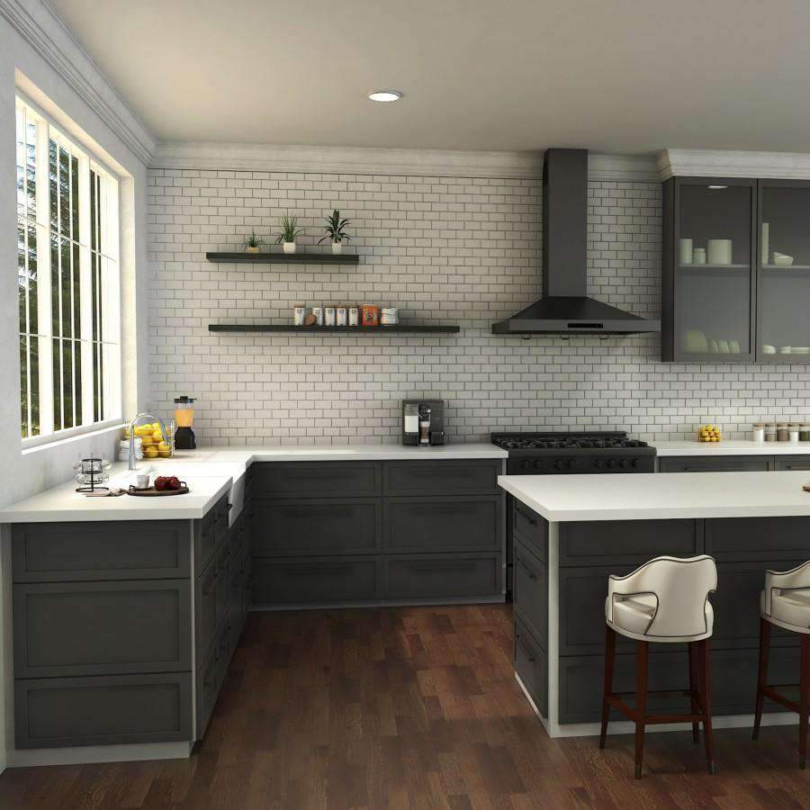 Chrome kitchen faucet installed on white sink in a dark cabinetry kitchen