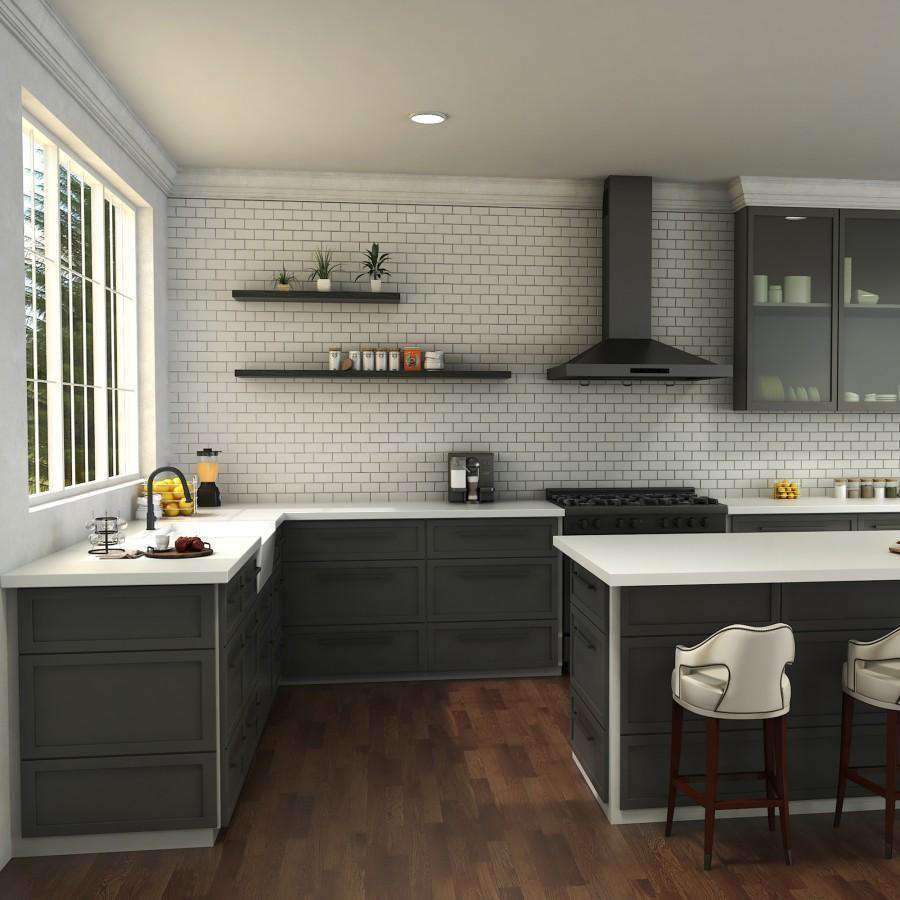 Matte black kitchen faucet on a white sink in a modern kitchen