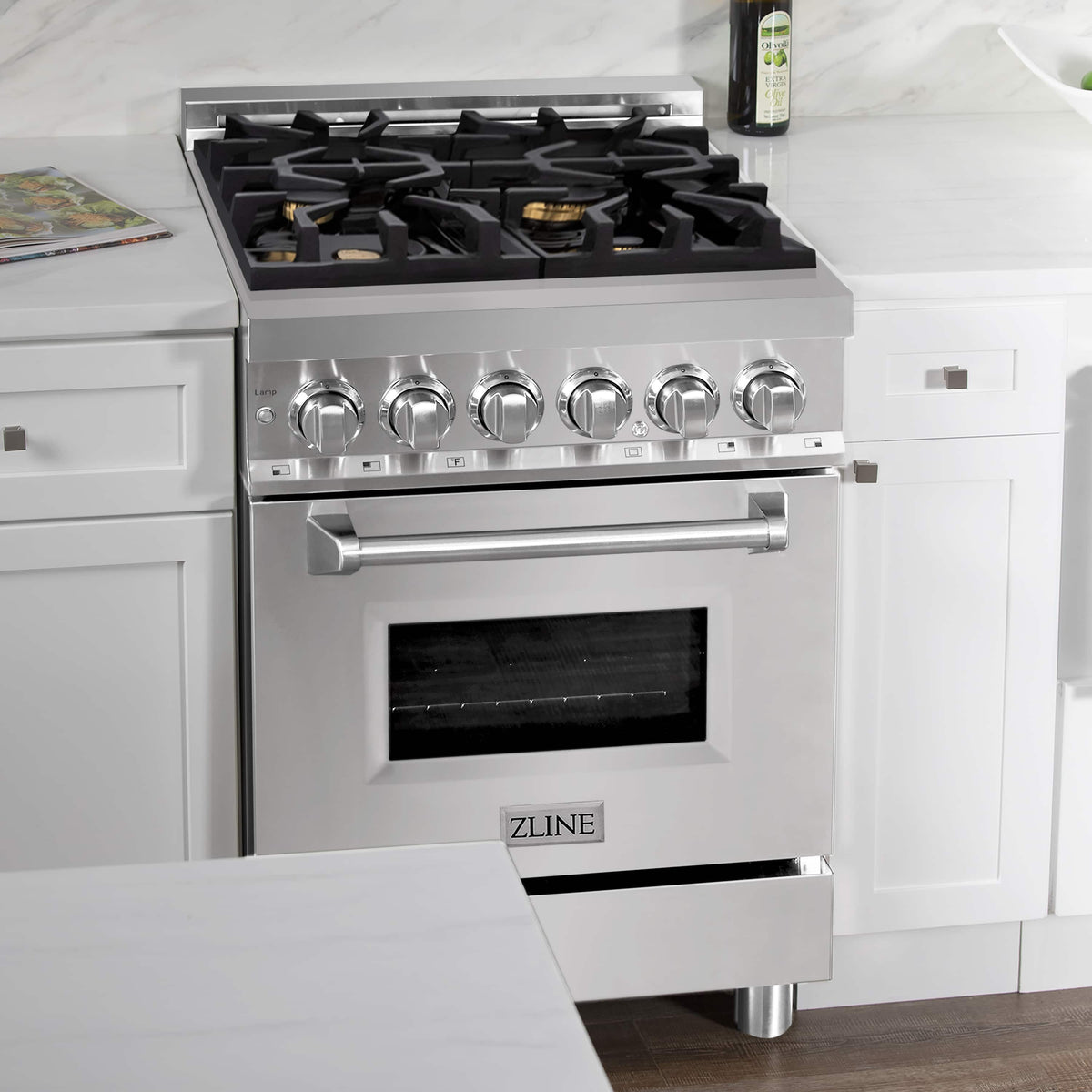 Stainless steel dual fuel range with black burner grates and large oven window
