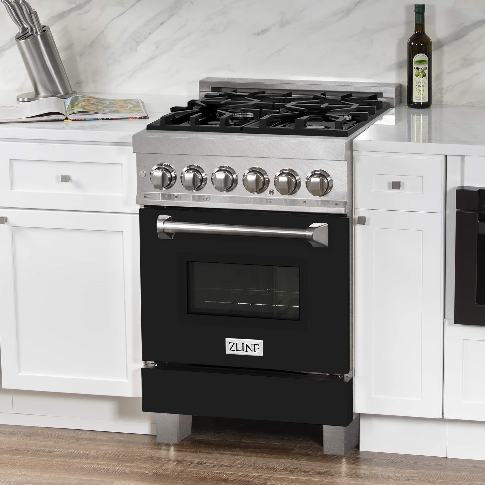 Stainless steel dual fuel range with black matte oven door and front control knobs