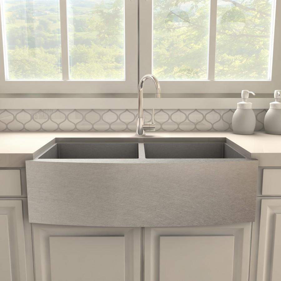 Chrome kitchen faucet with arched spout and single lever handle.