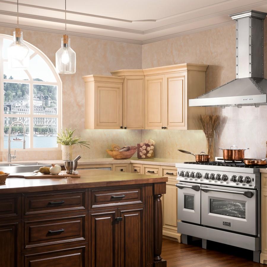 Brushed nickel kitchen faucet with pull-down sprayer in a home kitchen setting