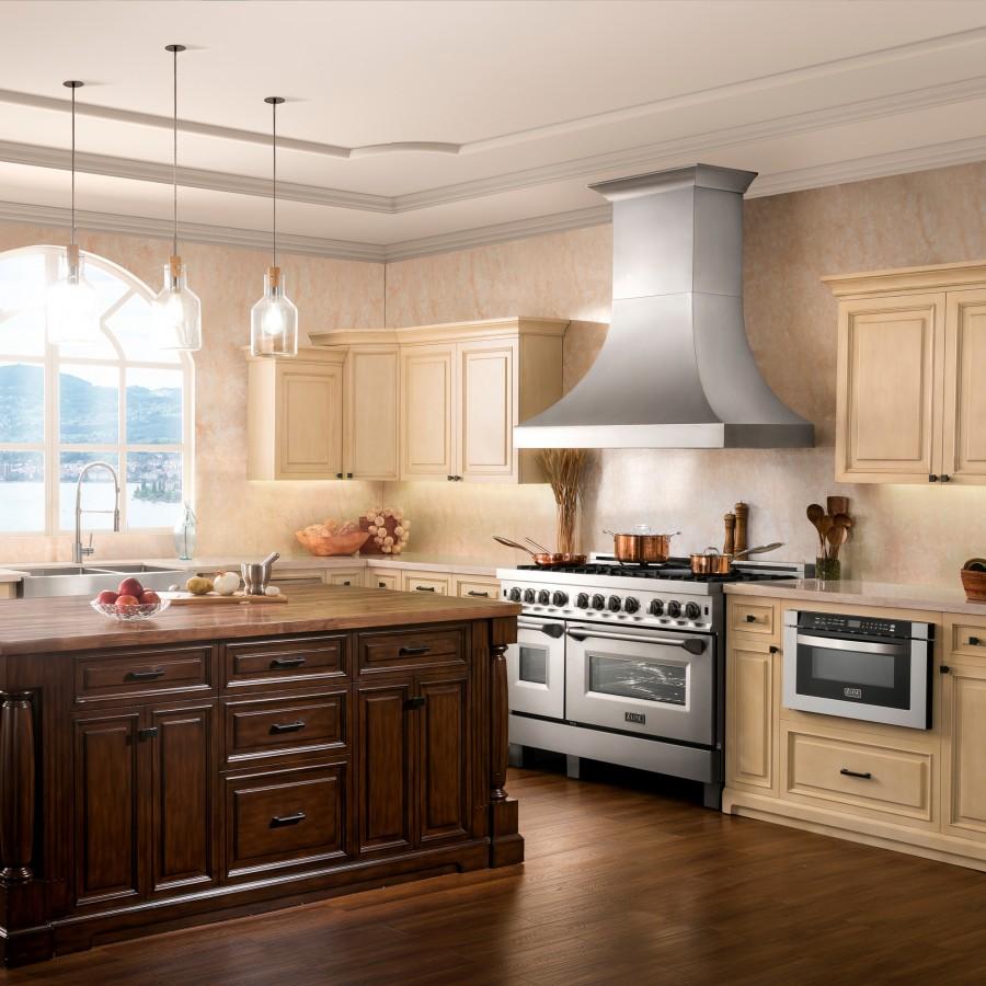 Brushed nickel kitchen faucet with arched spout and streamlined controls