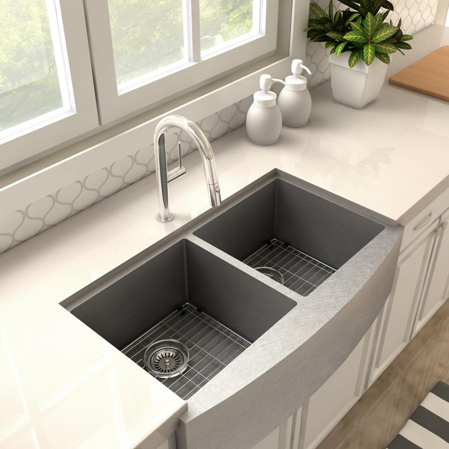 Chrome kitchen faucet with tall arched spout over double-basin sink