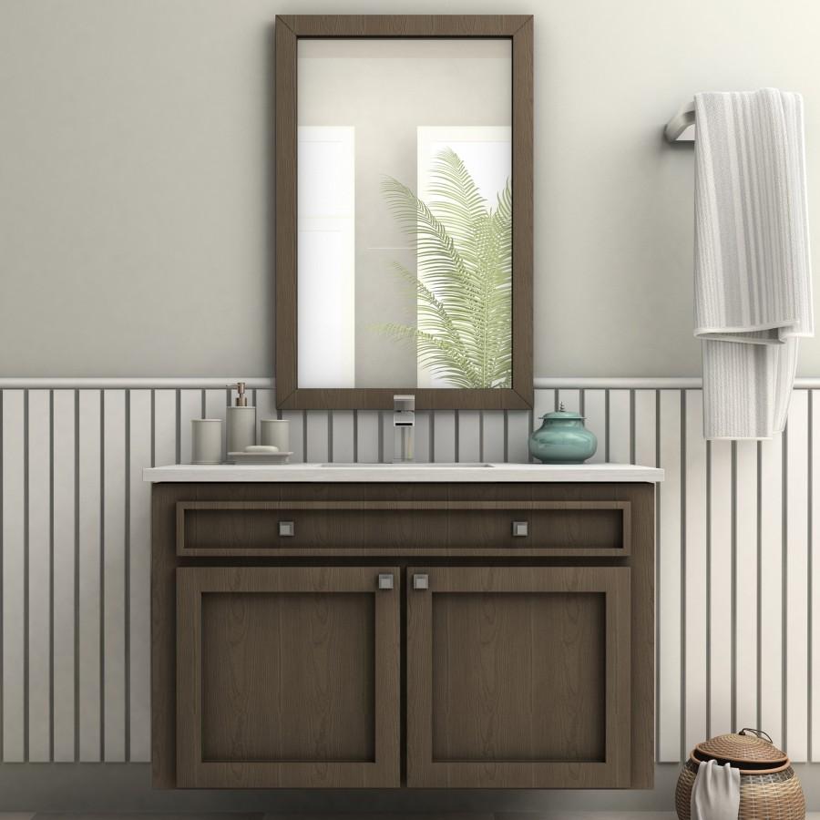 Chrome single-handle bath faucet on vanity counter with rectangular spout